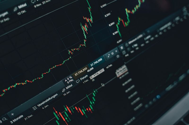 Mobile phone displaying DeFi banking and cryptocurrency trading application interface