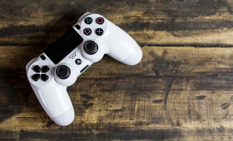 Gaming TV setup showing 120Hz high refresh rate for smooth gameplay on PlayStation and Xbox