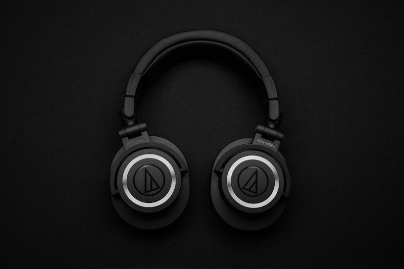 Person with headphones enjoying AI-personalised music streaming