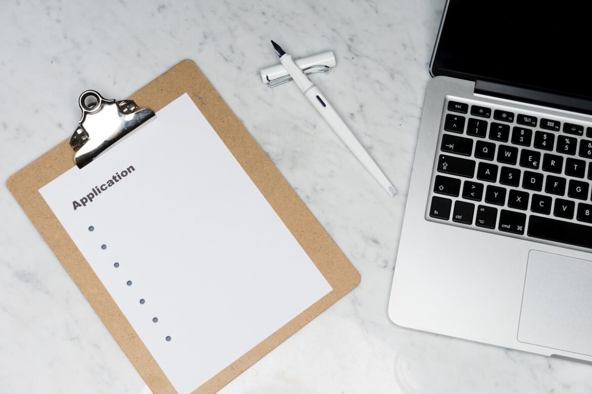 Tax documents and calculator on desk for tax season preparation