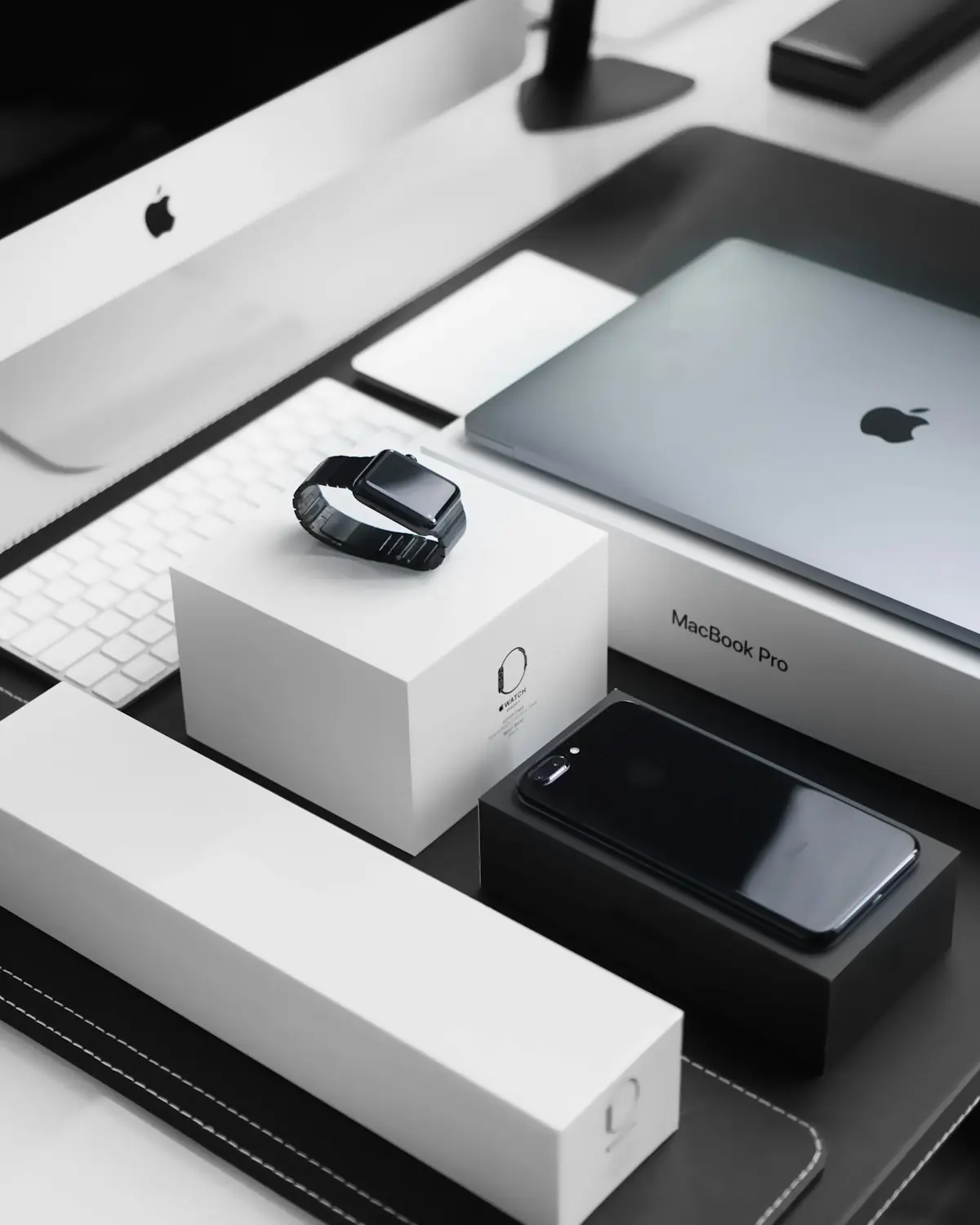 Apple services ecosystem MacBook laptop software revenue 2026