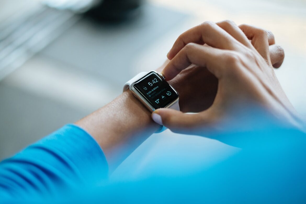 Smartwatch wearable health tracker on wrist fitness monitoring 2026